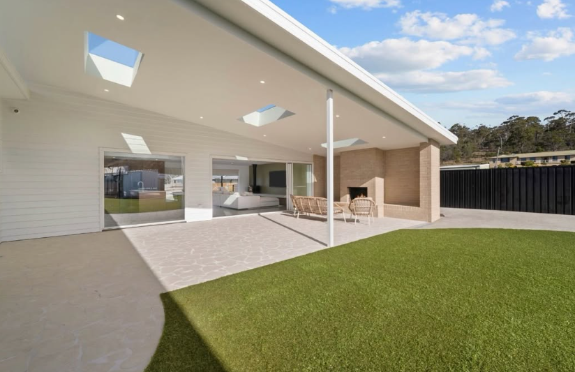 Coast House Orford with its sunny lawn and sheltered patio